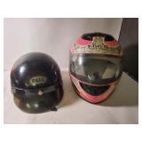 2 small motorcycle helmets used