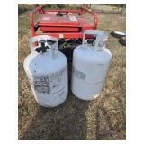 Two midsize propane tanks