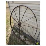 Antique metal wagon wheel
