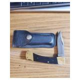 Buck 110 4' blade folding knife with sheath