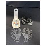 Lot with cast iron chickens and chicken spoon