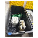 Large tote of chemicals and sprayer