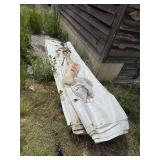 Large tarps and straps.