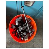 Bucket of rebar spikes