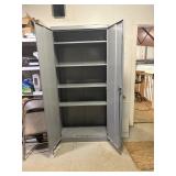 Large metal cabinet with shelves gray