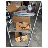 Four boxes of new metal hangers