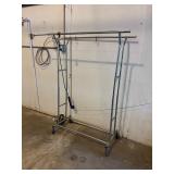 Rolling clothing rack