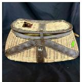 vintage wicker and leather fishing creel basket