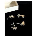 Lot of four sterling silver 925 charms 7.5g