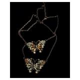 Lot of two brass butterfly necklaces