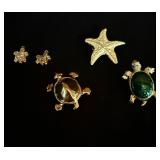 Lot of jewelry, turtles, and starfish