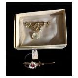 2 Brooches one Coro has tag