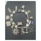Charm bracelet w/ 11 sterling charms some masonic
