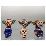 Mexican clay skull candle holders