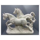 White Porcelein galloping horses