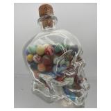 Skull jar with marbles