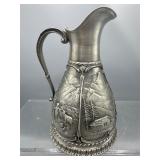 Embossed pewter SKS pitcher