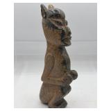 Carved stone statue
