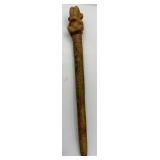 Carved stone figural hair or cloak pin