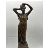 Woman goddess metal statue