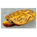Carved stone turtle amulet