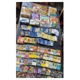 Pokï¿½mon cards with toy and comic books