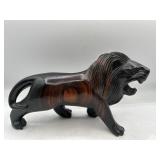 Carved wooden lion figure