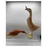 Folk art wooden duck figures