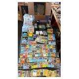 Pokï¿½mon card collection with video games and Legos