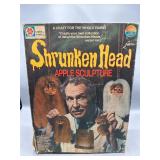 Vintage Shrunken Head apple sculpture