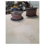 2 spools of electric wire. 4-55