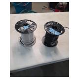 2 large spools of wire. 4-195