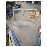 3 wood and metal sawhorses. 4-280