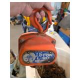 1.5-ton snatch block with a bucket of chain. 4-99