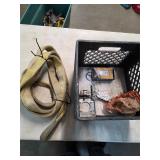 Tow strap and electric hardware in crate. 4-159