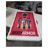 Body armor cornhole set. 4-76