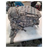 Military day bag with clothes and towels. 4-212