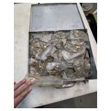 Metal box full of rivets. 4-295