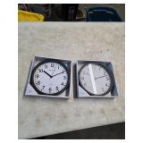 2 wall clocks. 4-235