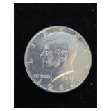 1964  90% Silver Kennedy 1/2 Dollar M-31