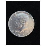 1964  90% Silver Kennedy 1/2 Dollar M-24