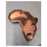 Brass topped Africa clock. 130-10