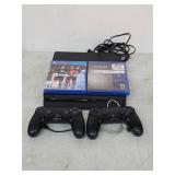 PS4 w 2 Wireless Controls and 2 Games K-64