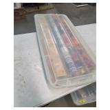 Tub with lid full of wrapping paper. 5-51