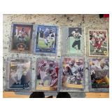 8 NFL Cards in Hard Plastic  37-23
