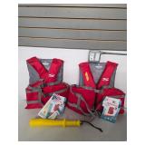 Adult oversize life vests and fish bonker. 17-3