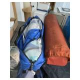 Pop up shelter and blow-up sleep pad. 25-29