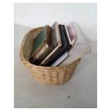 Wicker basket of vintage books and more. 45-58