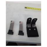 4 magazines, 2 with holder. N-7