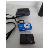 Canon digital camera with case and charger. 11-8